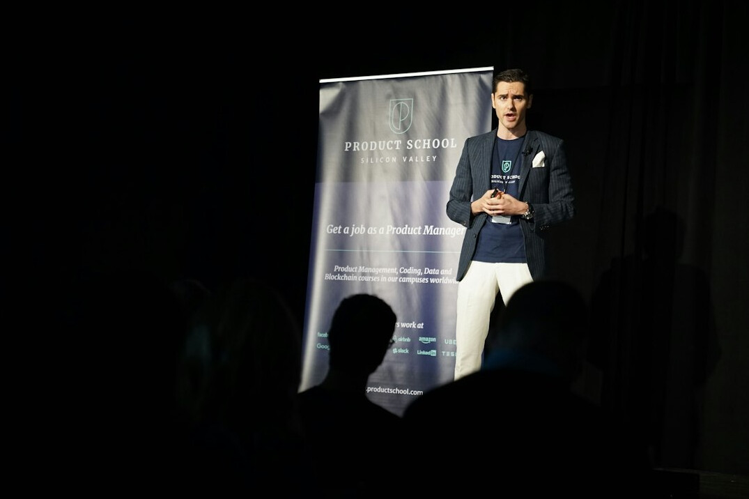 business leader presenting on stage