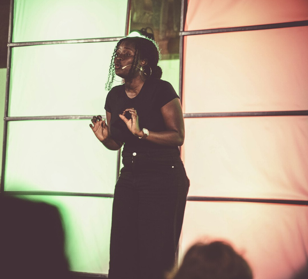 executive speaking confidently on stage