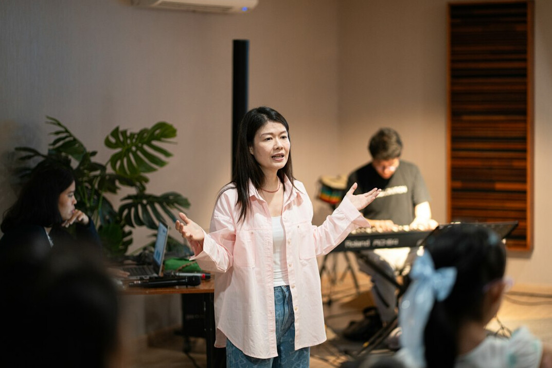 woman practicing voice exercises